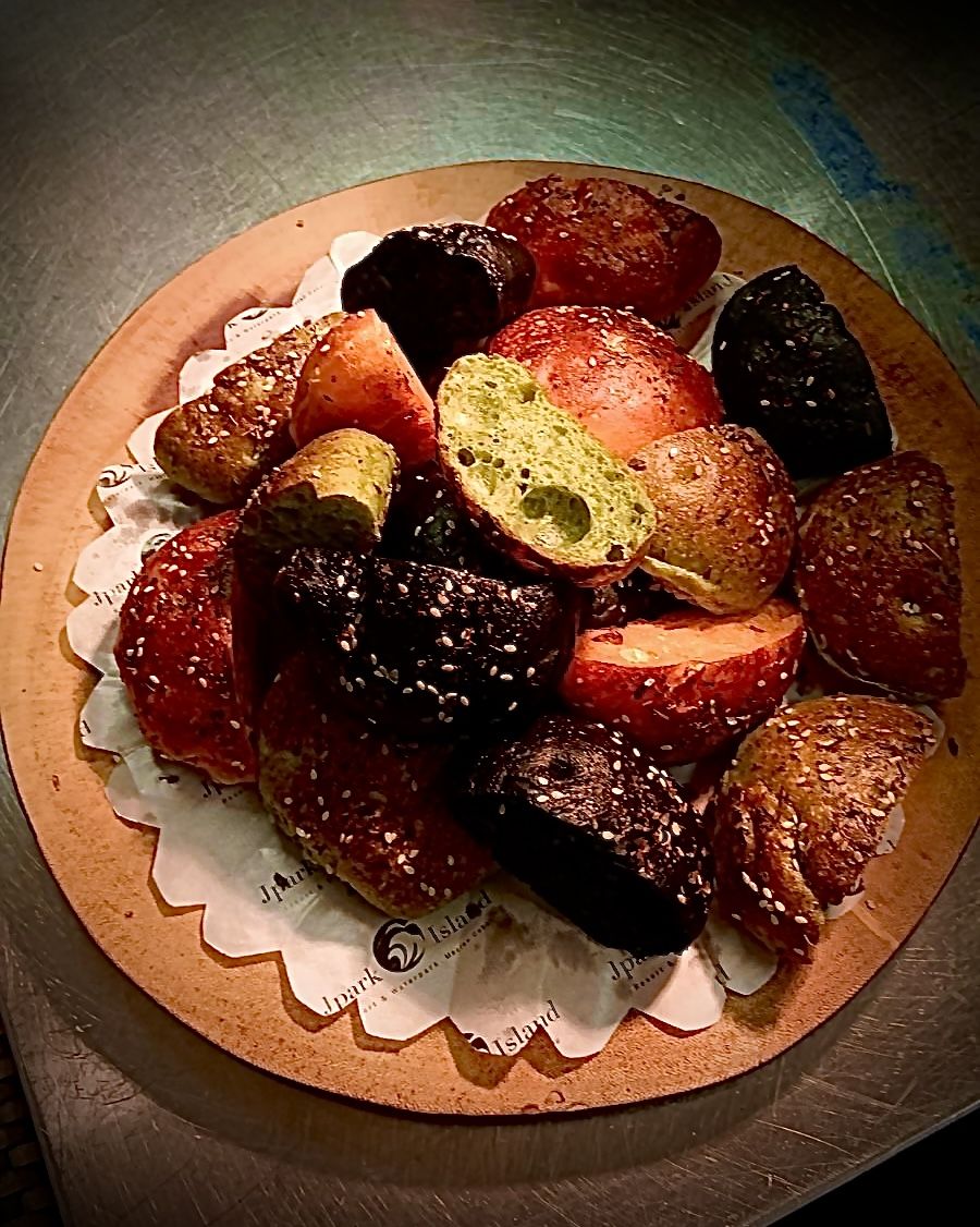 Bread basket with colored sesame rolls, Chef Moreno Benigno hotel F&B consulting