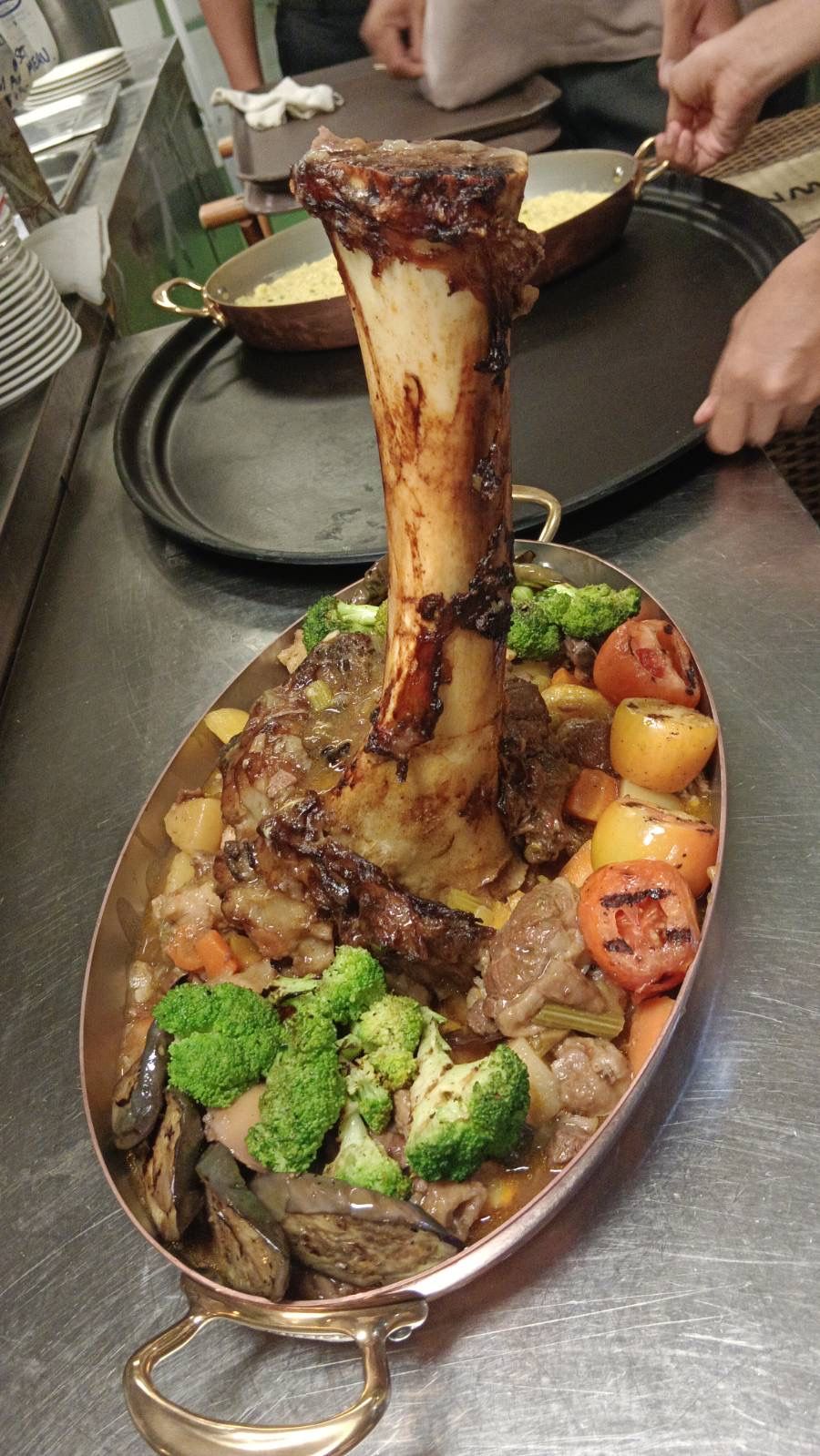 Thor's Hammer ossobuco with vegetables in a copper pan, by Chef Moreno Benigno