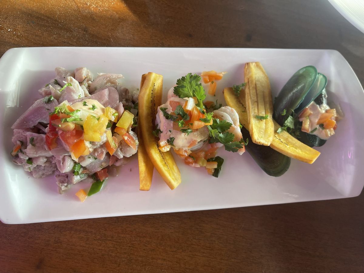 Ceviche trio of fish, shrimp and mussels with fried plantain, by Chef Moreno Benigno